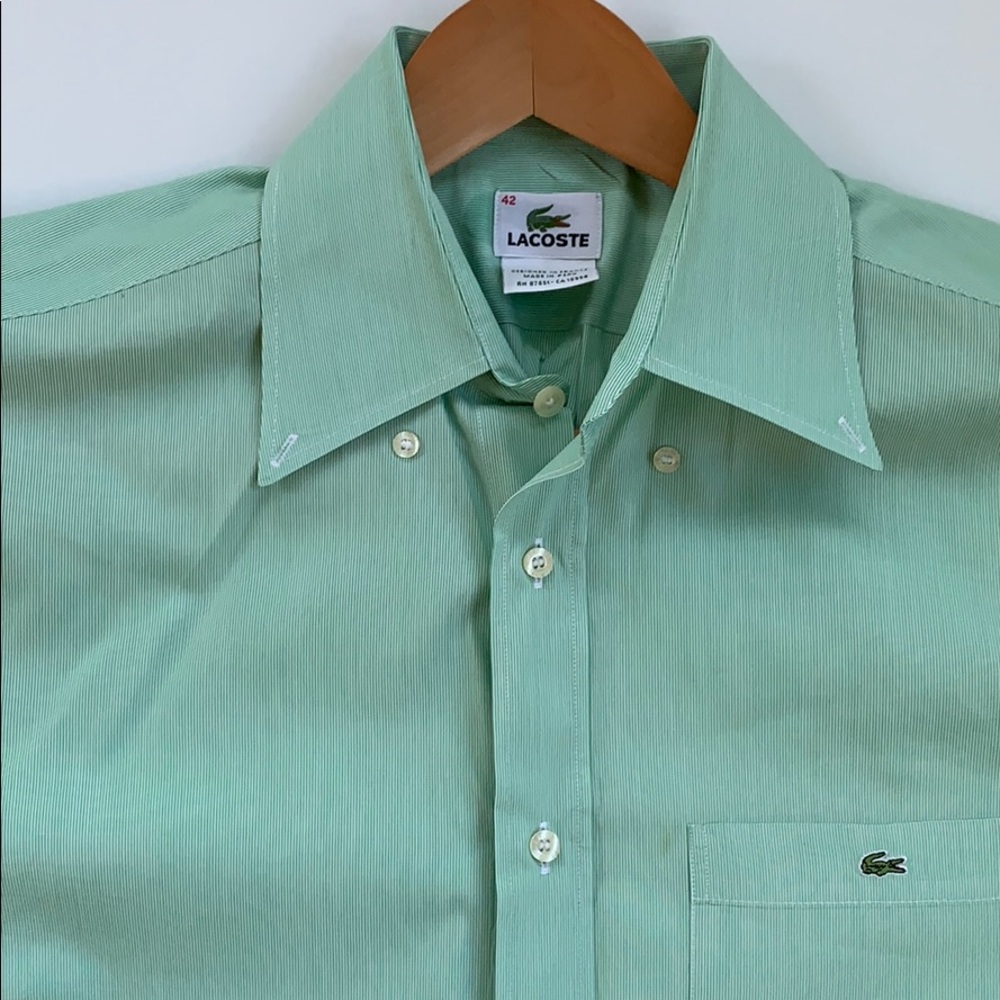 Green Lacoste shirt.